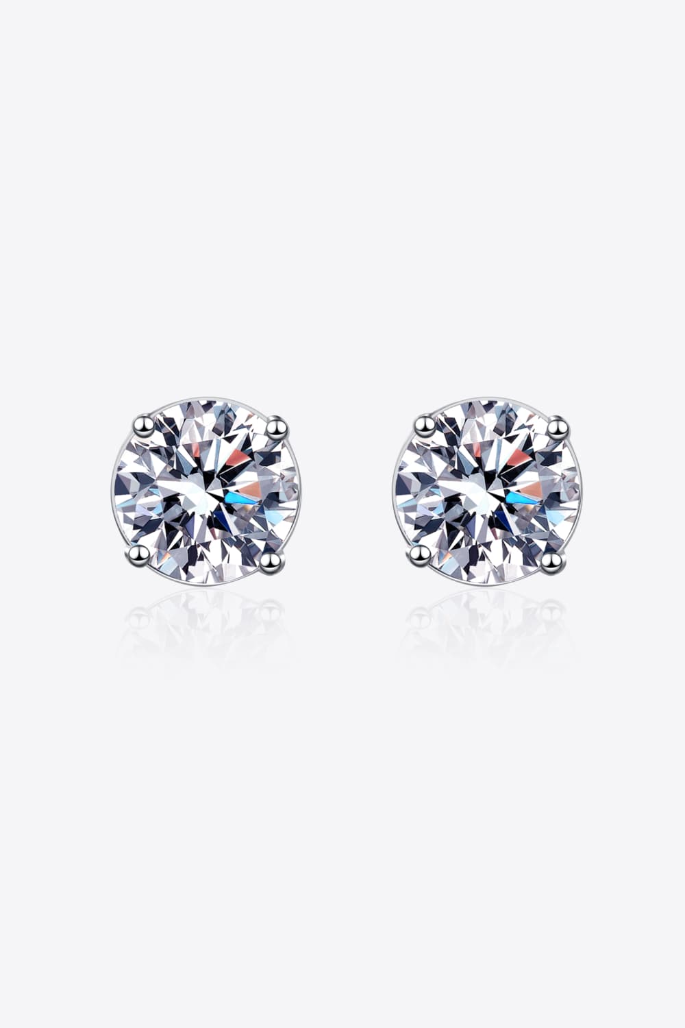 Moissanite solitaire stud earrings with rhodium finish in silver