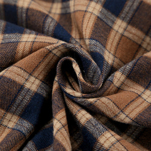 Oversized brown plaid button-up shirt jacket fabric detail