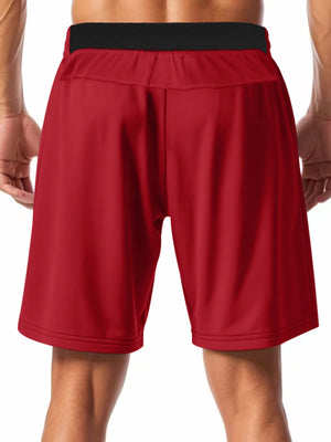 Bright red chino shorts with black elastic waistband and drawstring detail.