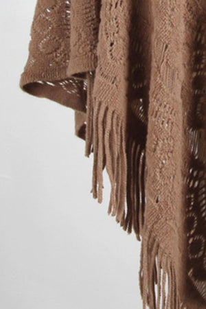 Camel crochet poncho with open knit pattern and fringe detail