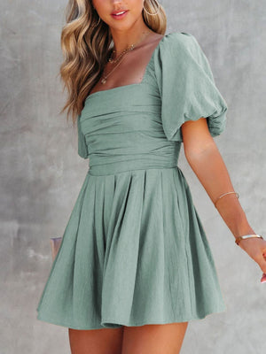 Sage ruched puff sleeve square neck romper with pleated skirt