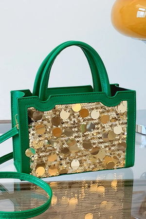 Green mini bag with gold sequin embellishments and top handles