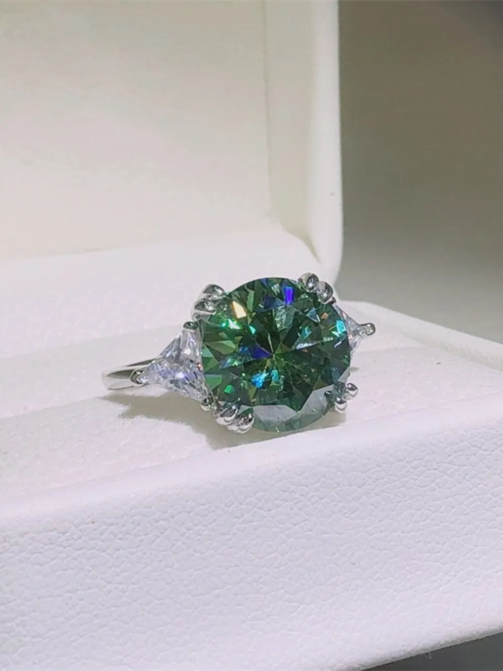 Emerald Prism Silver Ring with turquoise stone and clear accent stones.