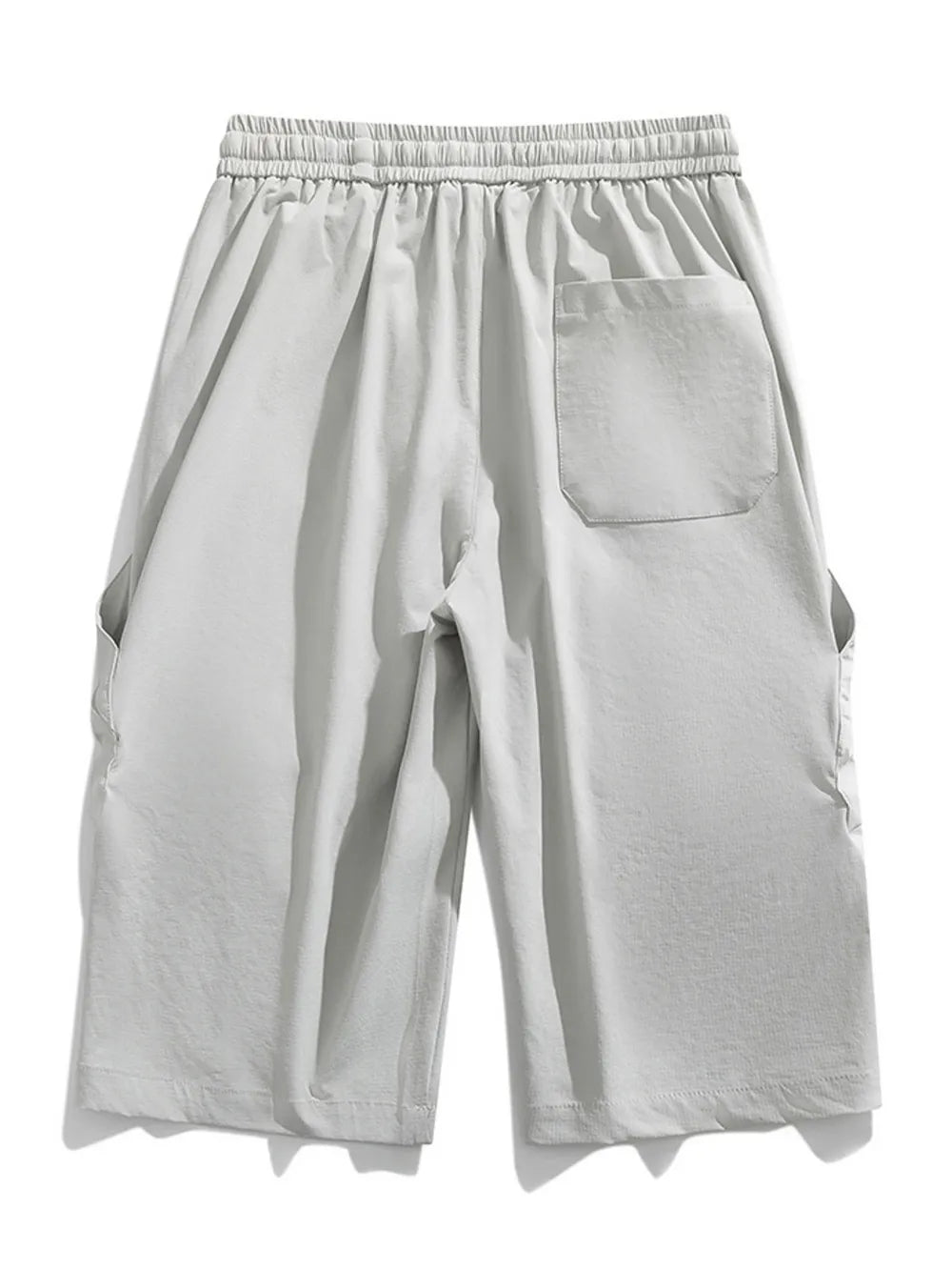 Men's light gray cargo capris with adjustable drawstring and back pocket.