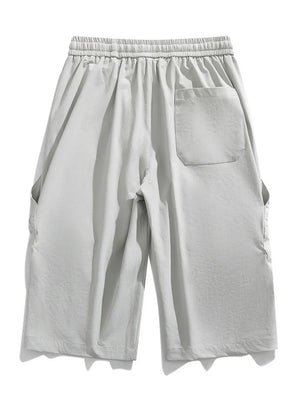 Men's light gray cargo capris with adjustable drawstring and back pocket.