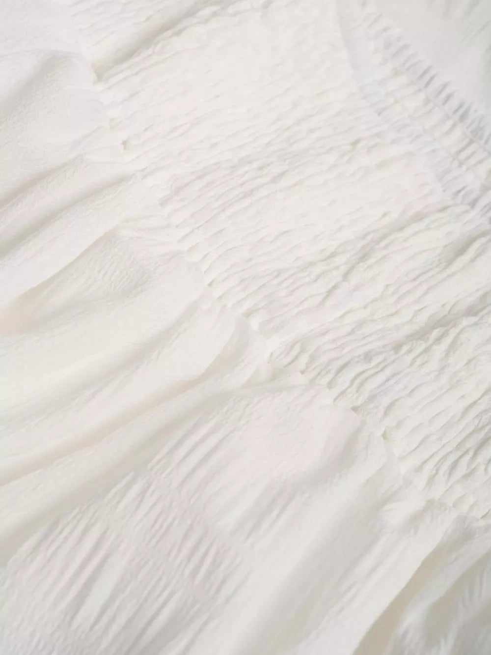 White crinkled tiered maxi skirt with smocked waist detail