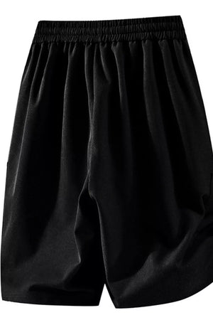 Black relaxed fit chino shorts with drawstring waist and pockets.