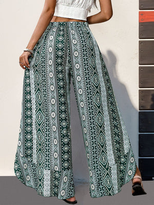 Geometric print palazzo pants in Air Force Blue with ruffle trim and wide legs.