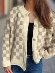 Checkerboard knit button-up cardigan in taupe and cream acrylic with button details.
