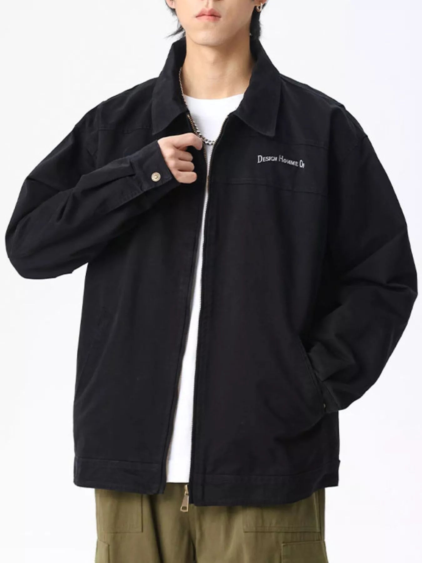 Men's black casual zip-up jacket with embroidered text detail on chest.
