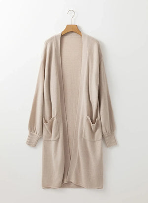Oversized sleeve maxi cardigan in Dust Storm with two front pockets and ribbed cuffs.
