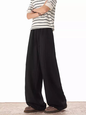 Black relaxed fit drawstring sweatpants with wide legs