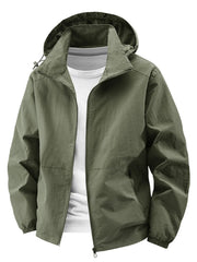 Army green hooded windbreaker jacket with zip front and pockets, worn over a white t-shirt.