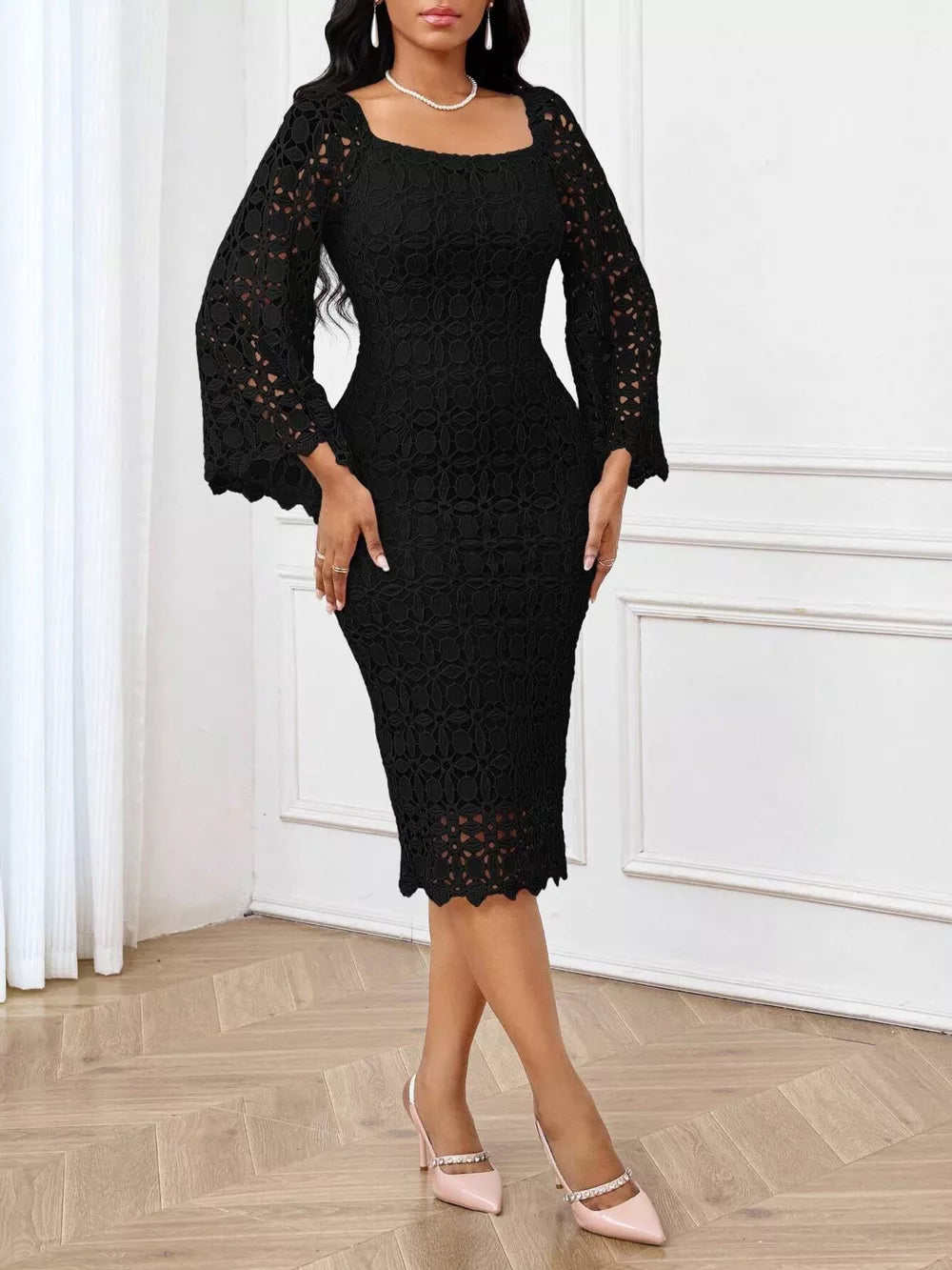 Black lace midi dress with square neckline and sheer bell sleeves.