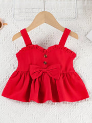 Red ruffle-trim baby top with bow and button detail