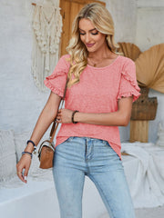 Coral flutter sleeve tee with a round neckline and textured fabric.