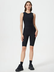 Black ribbed contour cycling shorts with a high waist and mid-thigh length.