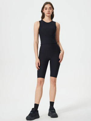 Black ribbed contour cycling shorts with a high waist and mid-thigh length.