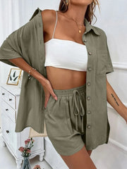 Sage linen shirt and shorts set with drawstring waist and button front.