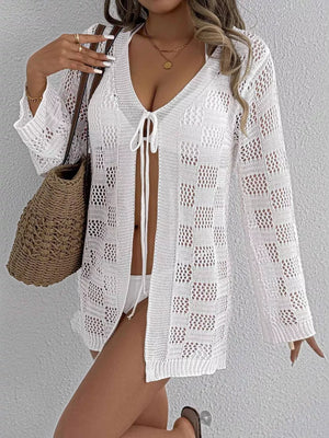 White openwork tie-front crochet cover-up with a v-neck and long sleeves.