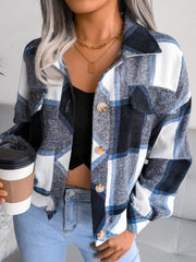 Oversized blue tartan shacket with patch pockets and button front.