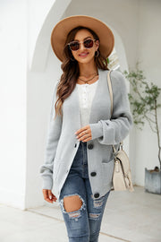 Cloudy Blue waffle knit oversized cardigan with button front and pockets.