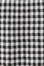 Houndstooth knit halter tank top in black and white acrylic.