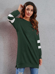 Dark green polyester sweatshirt dress with white varsity stripes on sleeves.