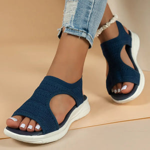 Dark Navy knit Peek-a-Boo Block Heel Mules with white-painted toenails