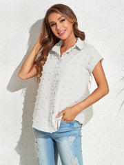 White textured dot poplin shirt with short sleeves and a collared neckline.