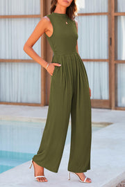 Ribbed mock neck jumpsuit in matcha green with wide legs and pleats.
