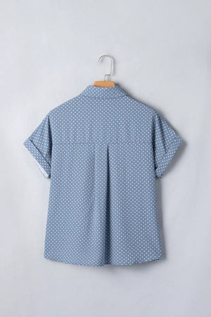 Blue polka dot cuffed short sleeve polyester shirt with button front and collar.