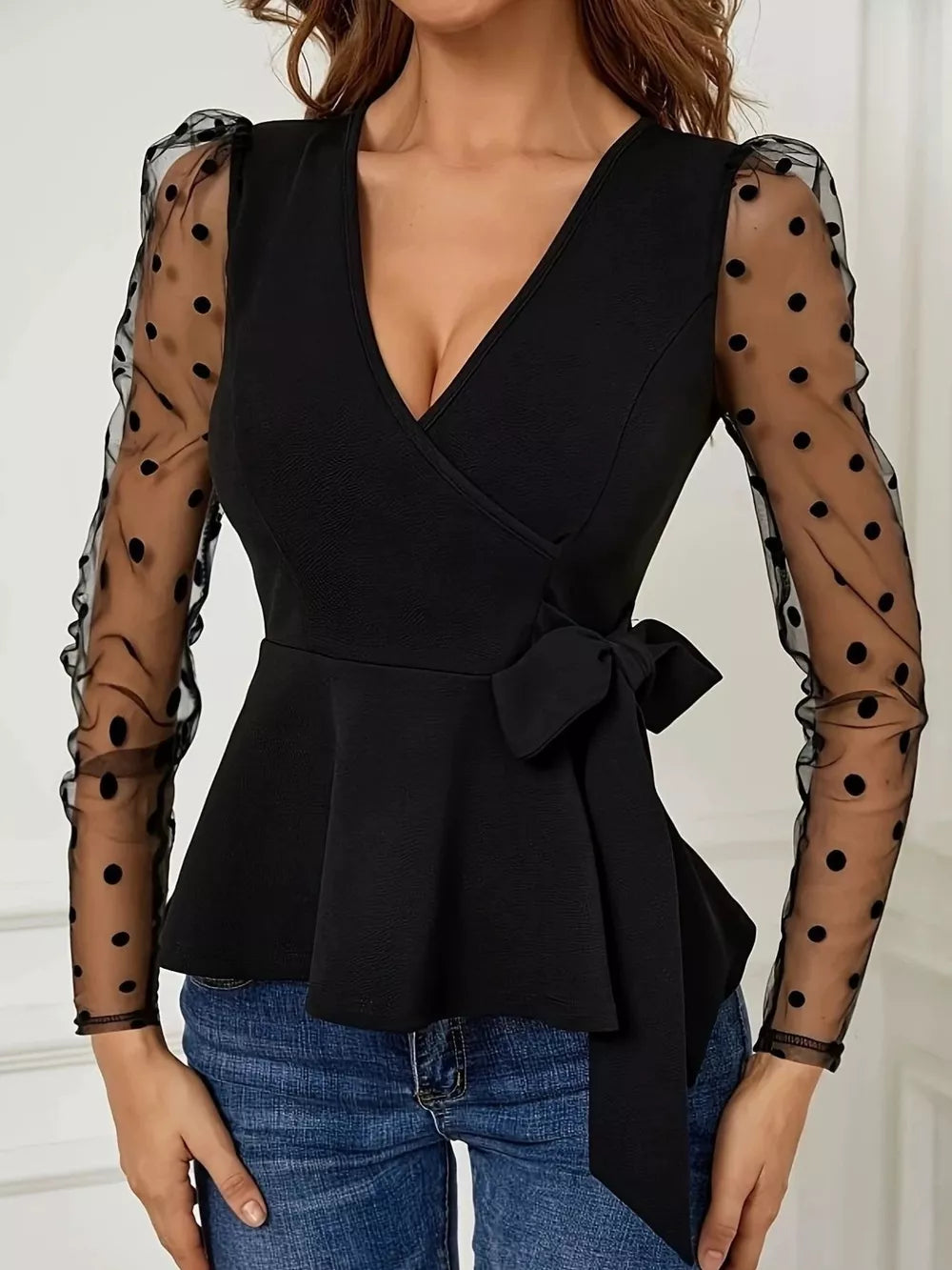 Polka Dot Mesh Sleeve Wrap Top in Black, front view
