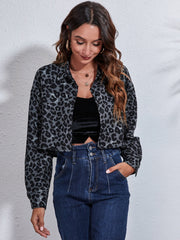 Checkerboard cropped shirt jacket in gray black leopard print with button front and collar.