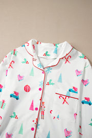 White pajama set with festive Christmas print and contrast trim.