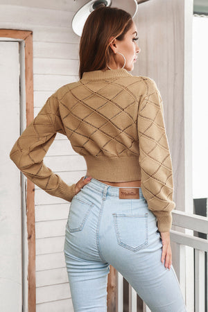 Camel diamond knit cropped sweater with openwork details and a ribbed hem.