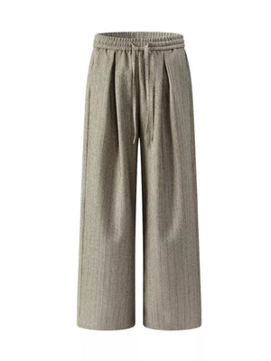 Khaki wide-leg pleated trousers for men with drawstring waist and vertical pinstripe detail.