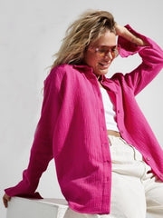Textured cotton overshirt in hot pink with relaxed fit and button front.
