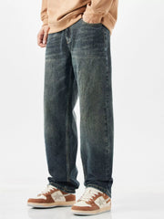 Relaxed fit vintage wide-leg jeans in blue denim with a faded wash.