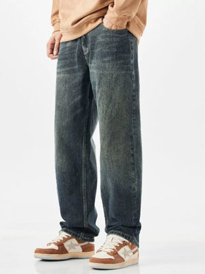 Relaxed fit vintage wide-leg jeans in blue denim with a faded wash.