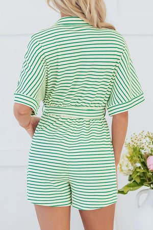 Green striped resort shirt romper with tie waist and short sleeves.