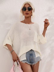 Ivory relaxed knit tunic top with boat neck, short sleeves, and a single chest pocket.