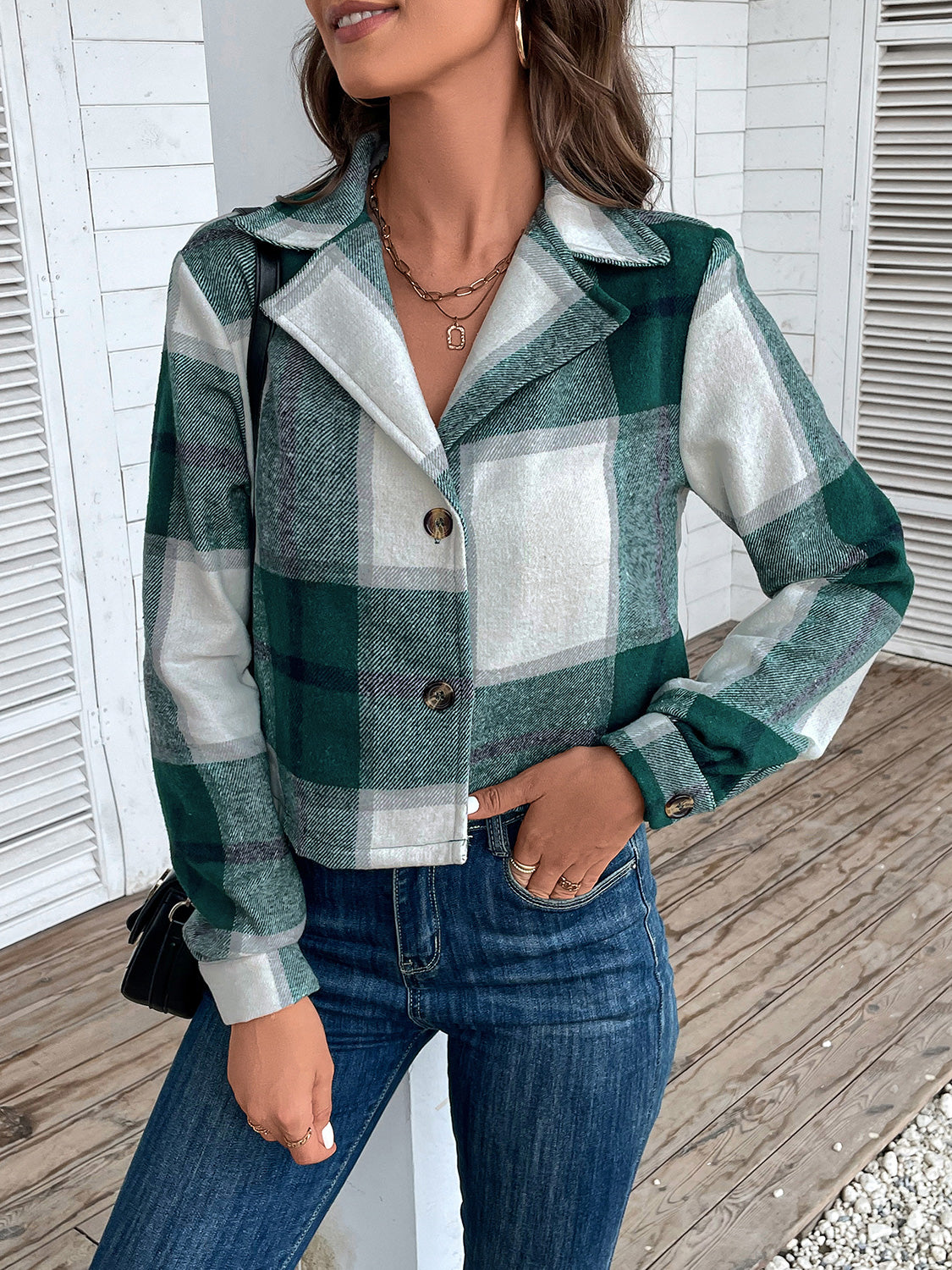 Green plaid cropped shirt jacket with statement collar and button front.
