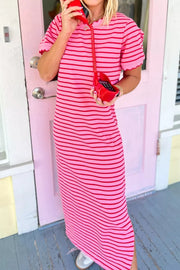 Vibrant striped maxi tee dress in pink and red with scalloped trim and short sleeves.