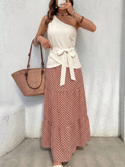 Cream one-shoulder top with tie waist and geometric print maxi skirt set