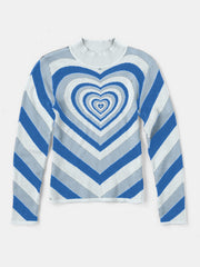 Mock neck sweater with blue, grey, and white chevron stripes and a concentric heart pattern.