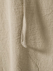 Men's beige cotton lace-up hooded top detail