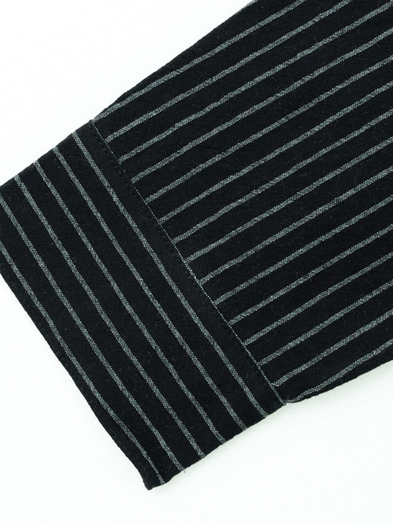 Men's black striped long sleeve shirt detail