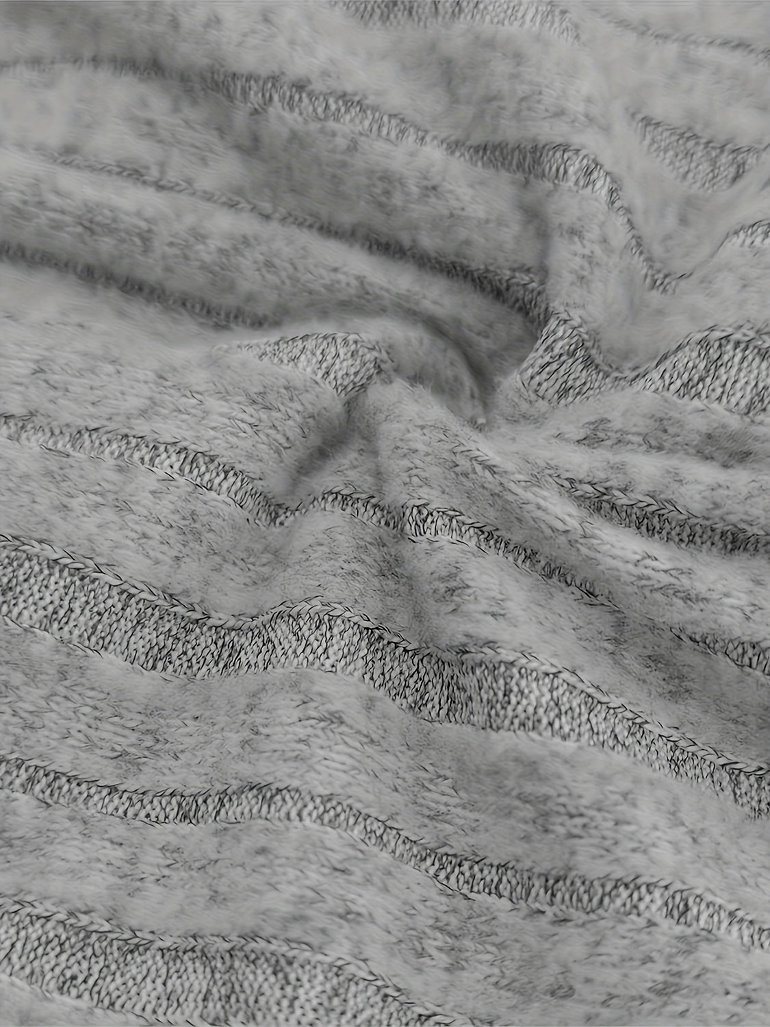 Gray ribbed cowl neck sweater with button cuffs and textured knit detail.