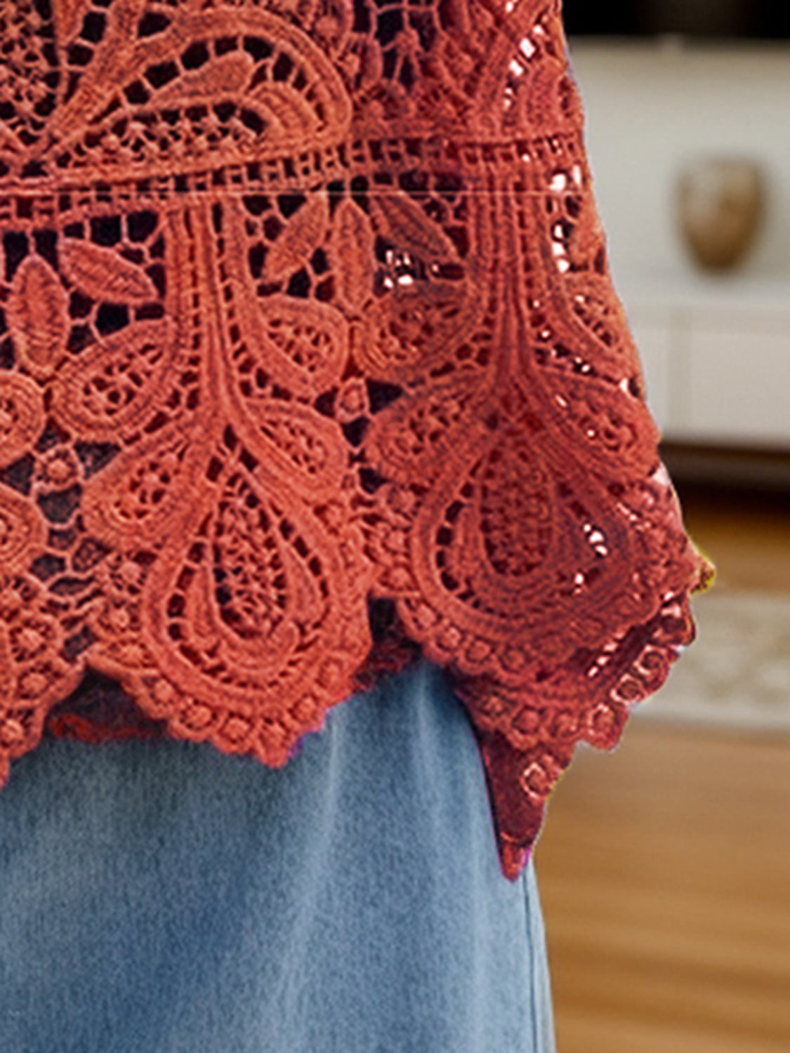Lace overlay cropped vest in Terracotta with intricate floral pattern and scalloped hem.